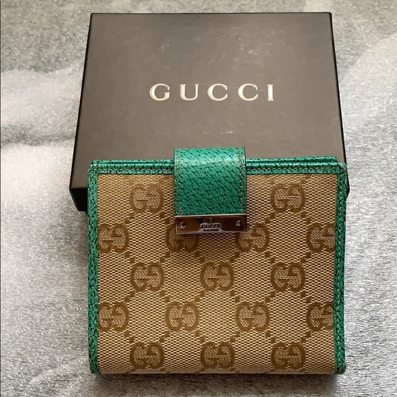 Gucci Handbags - Gucci bi-fold wallet in monogram/leather teal